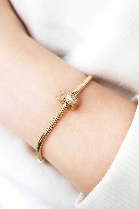 Złoty charms klips z białymi cyrkoniami pr.585