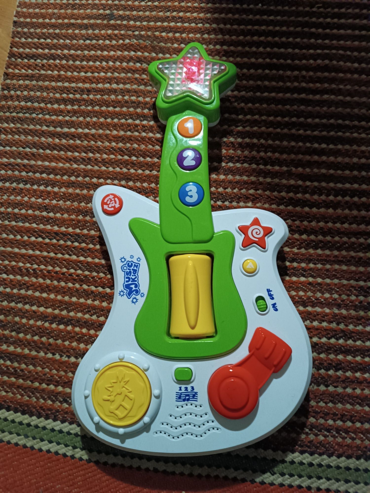 Дитяча іграшкова гітара в ідеальному стані