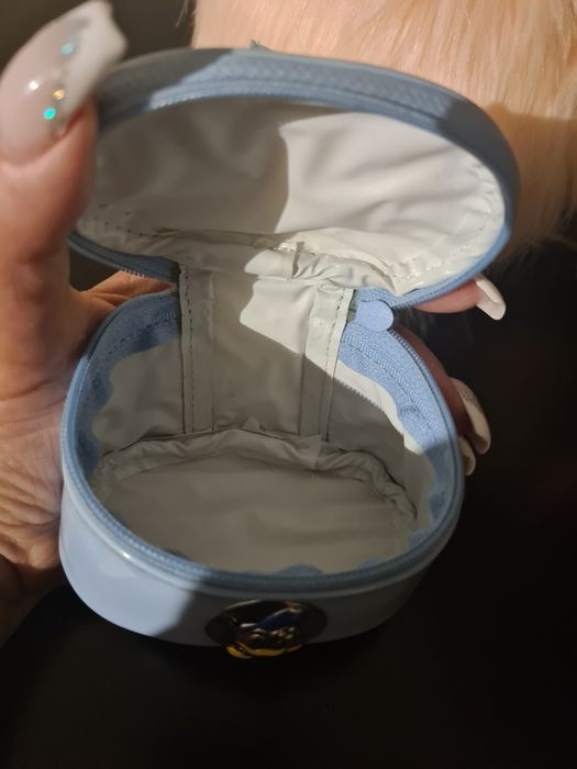 Porta chupeta forrado com emblema em prata