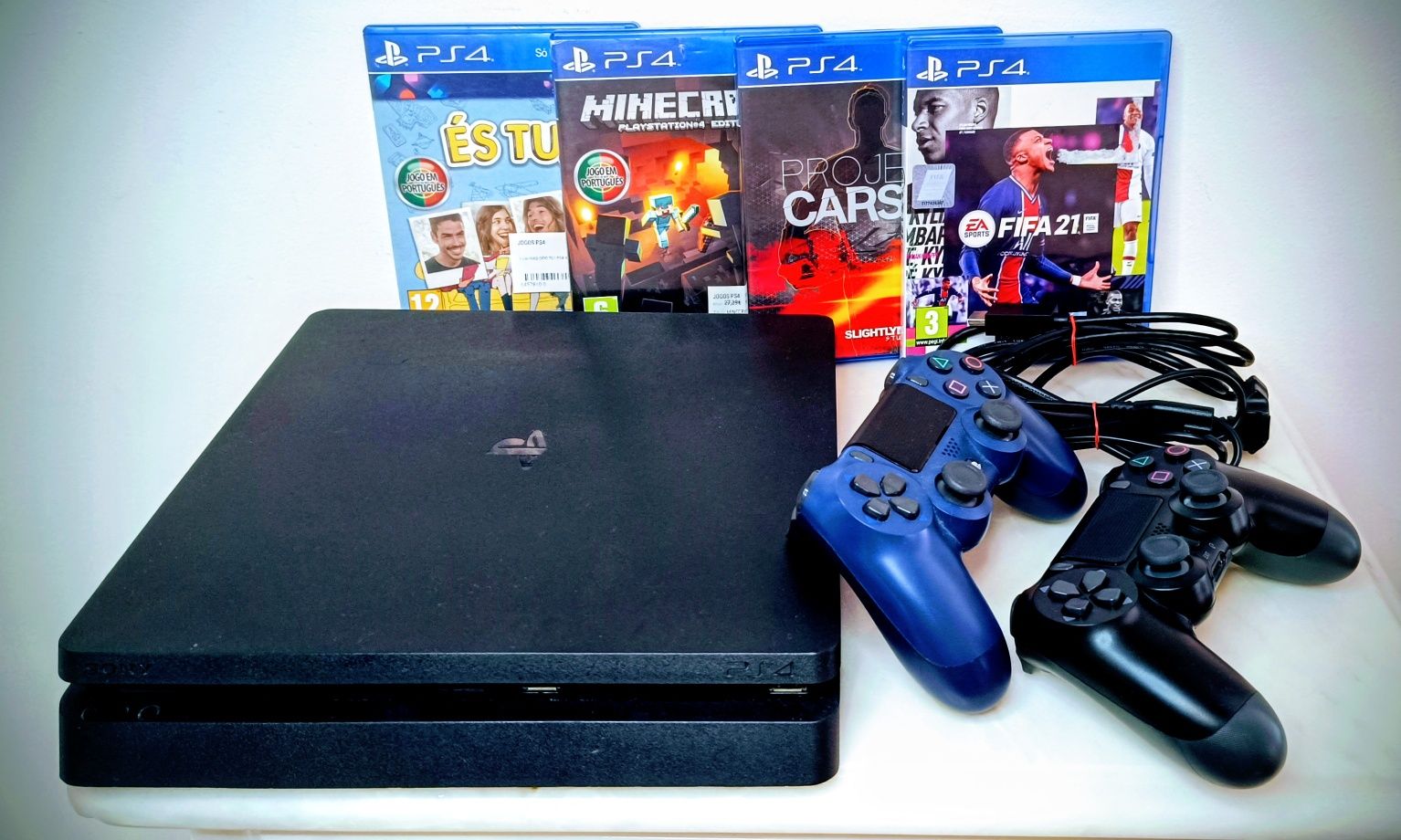 Playstation 4  + 2 comandos + 4 jogos