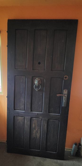 Solidne drzwi zewnętrzne, drewniane lewostronne
