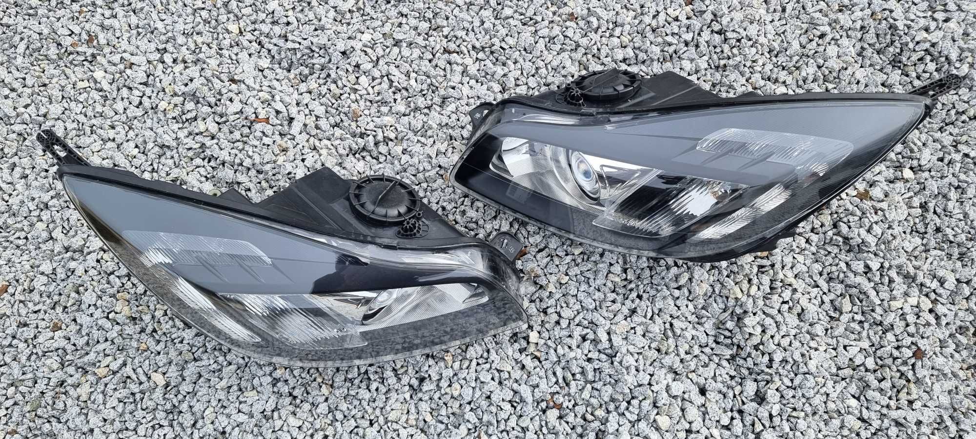 Lampy bi xenon Opel Insignia A skrętne regenerowane reflektory HELLA