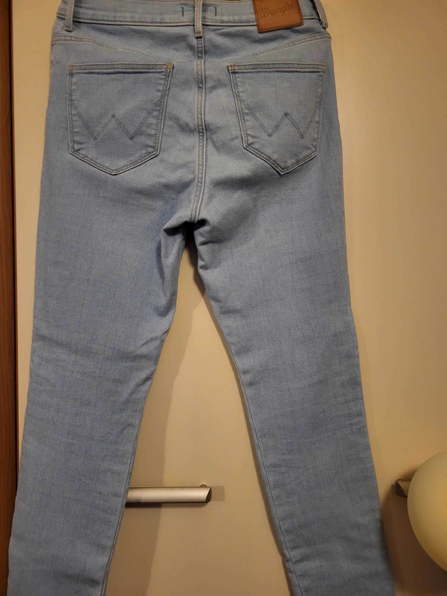 Spodnie jeans damskie jasne Wrangler