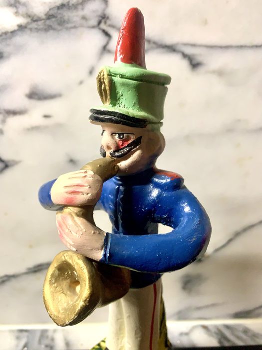 Estatueta de músico em terracota
