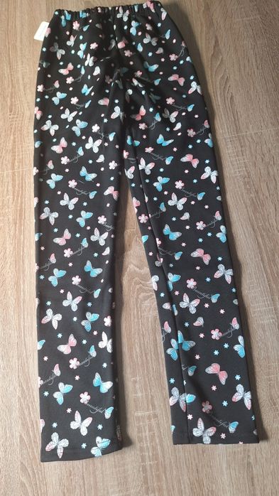 Leginsy ocieplane czarne z motylkami 152/158