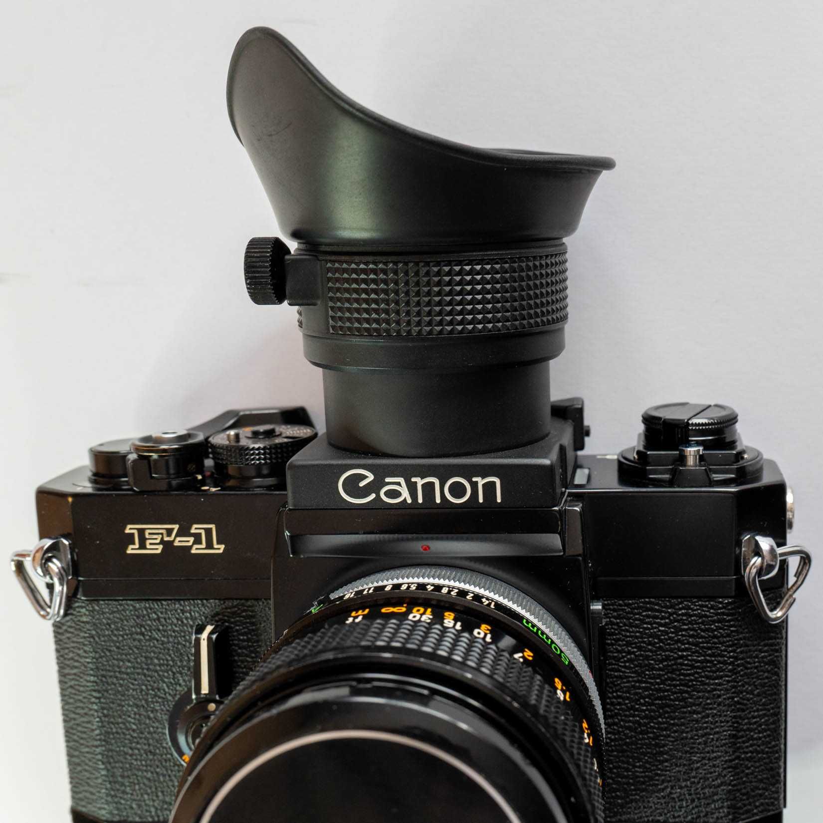 Aparat CANON F-1 + obiektyw Canon SSC 1,2/55- pryzmat lub poziom talii