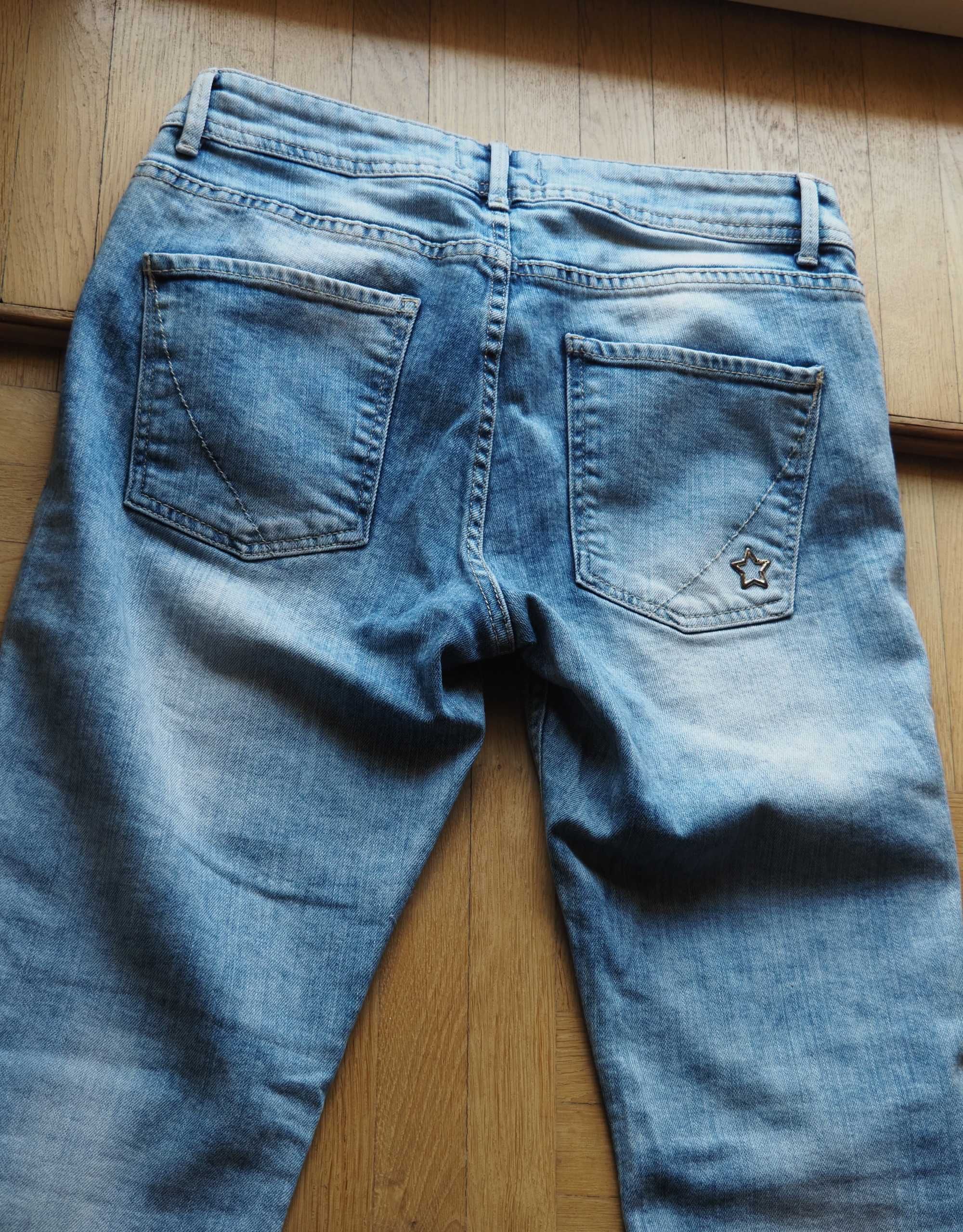 Jasne jeansy z przetarciami Cartoon stan idealny M
