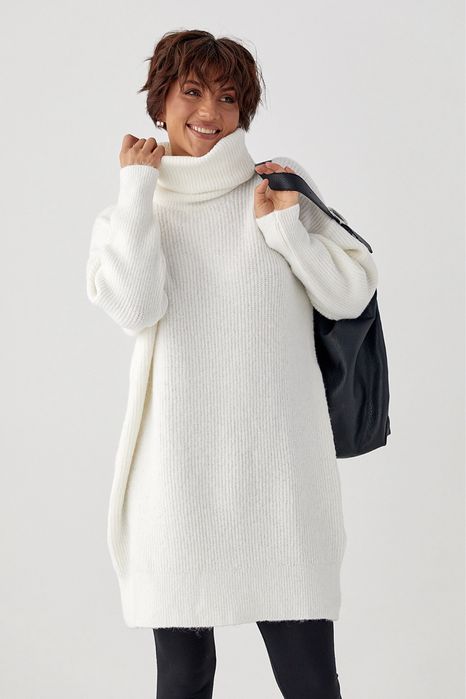 Жіноча вʼязана туніка