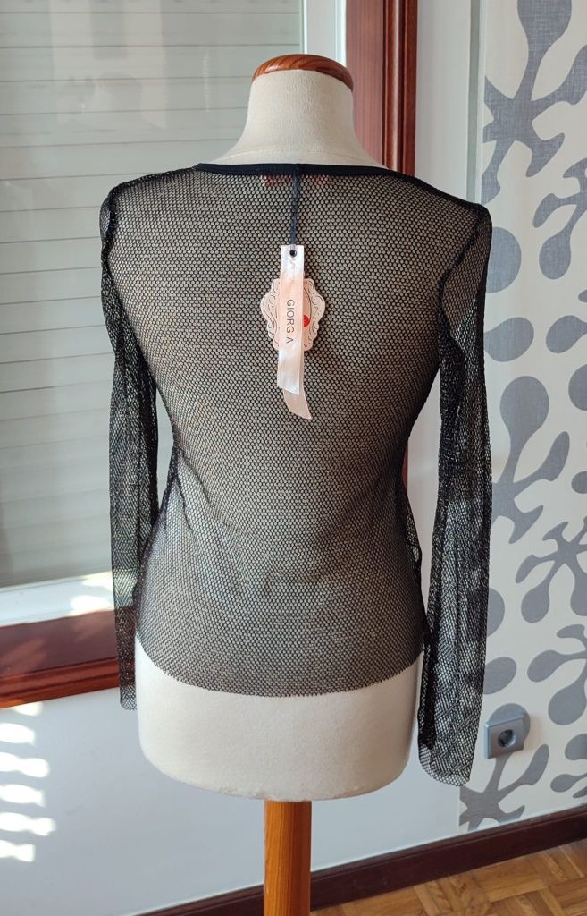Blusa Giorgia, preta transparente - Novo

- Tamanho S/M

Os portes são