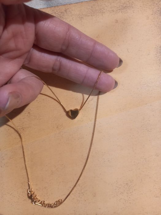 Fio dourado com coração