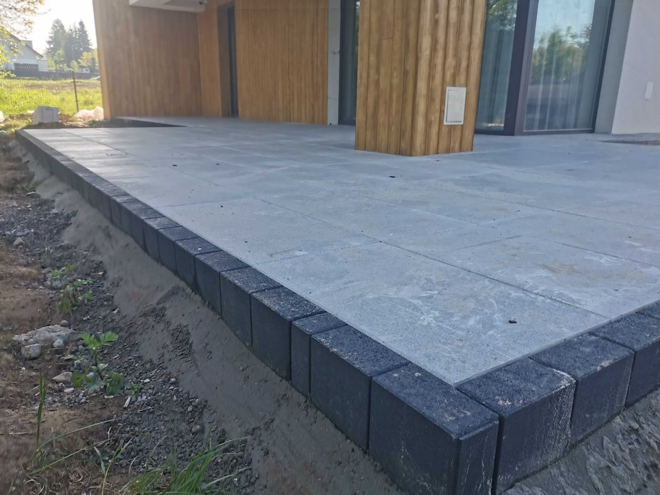 Brukarstwo Układanie kostki brukowej.