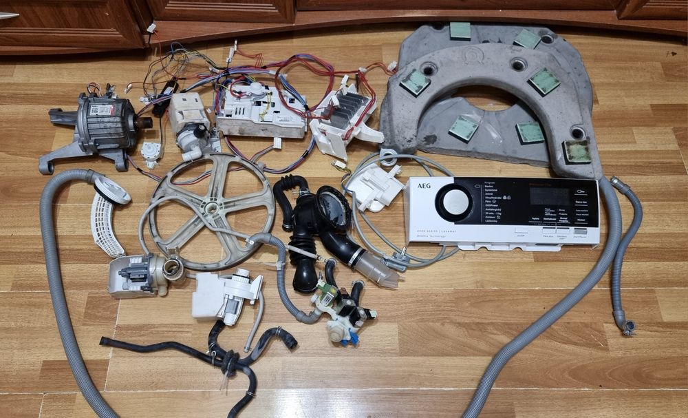 Запчасти на стиральную машину с вертикальной загрузкой  AEG