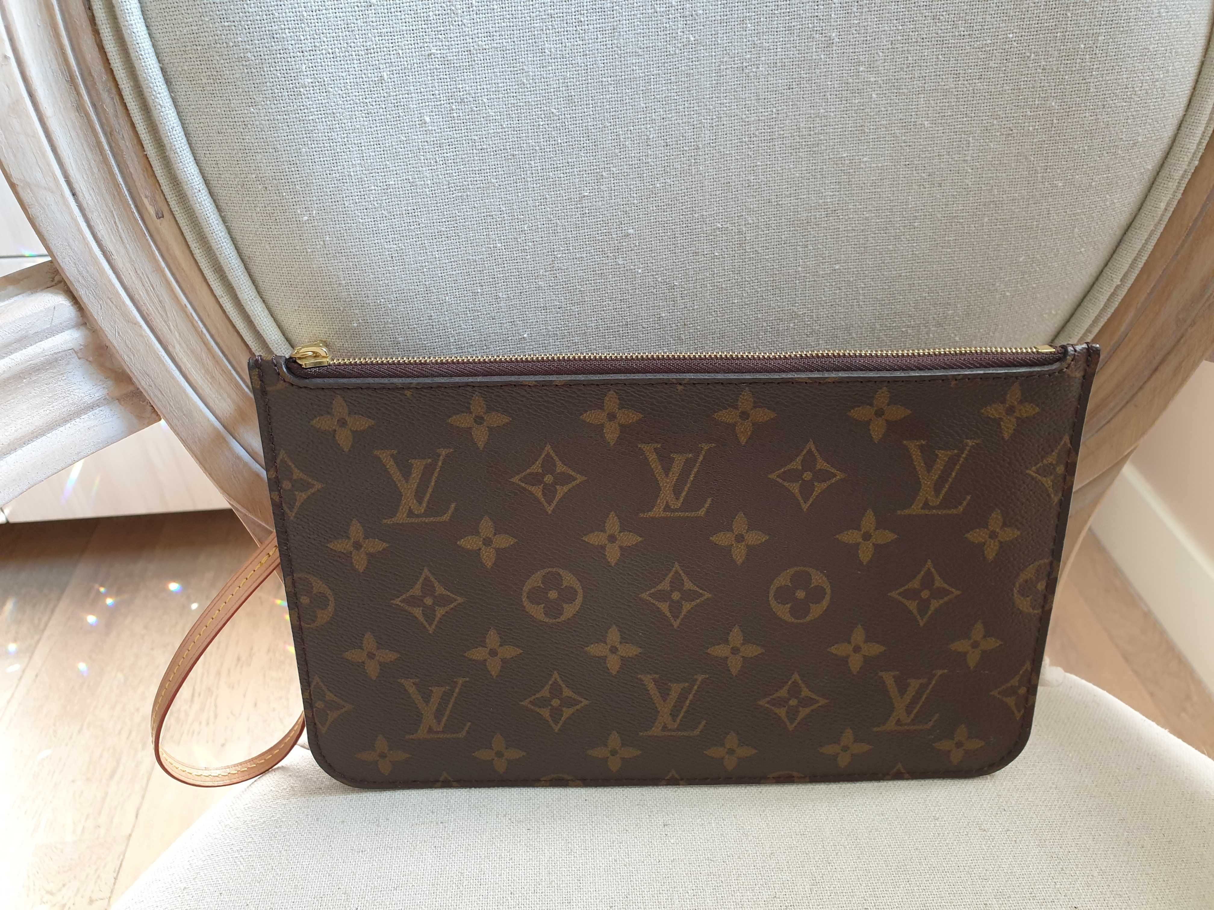 Oryginalna kopertówka marki Louis Vuitton Neverfull , nie noszona