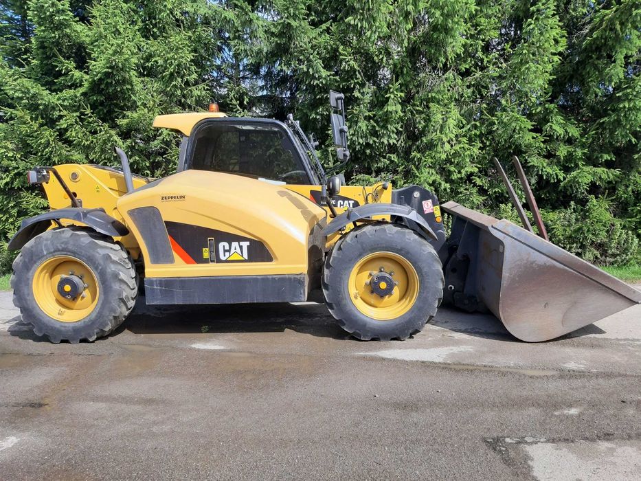 Ladowarka teleskopowa Caterpillar TH407C 2015, 6400mtg