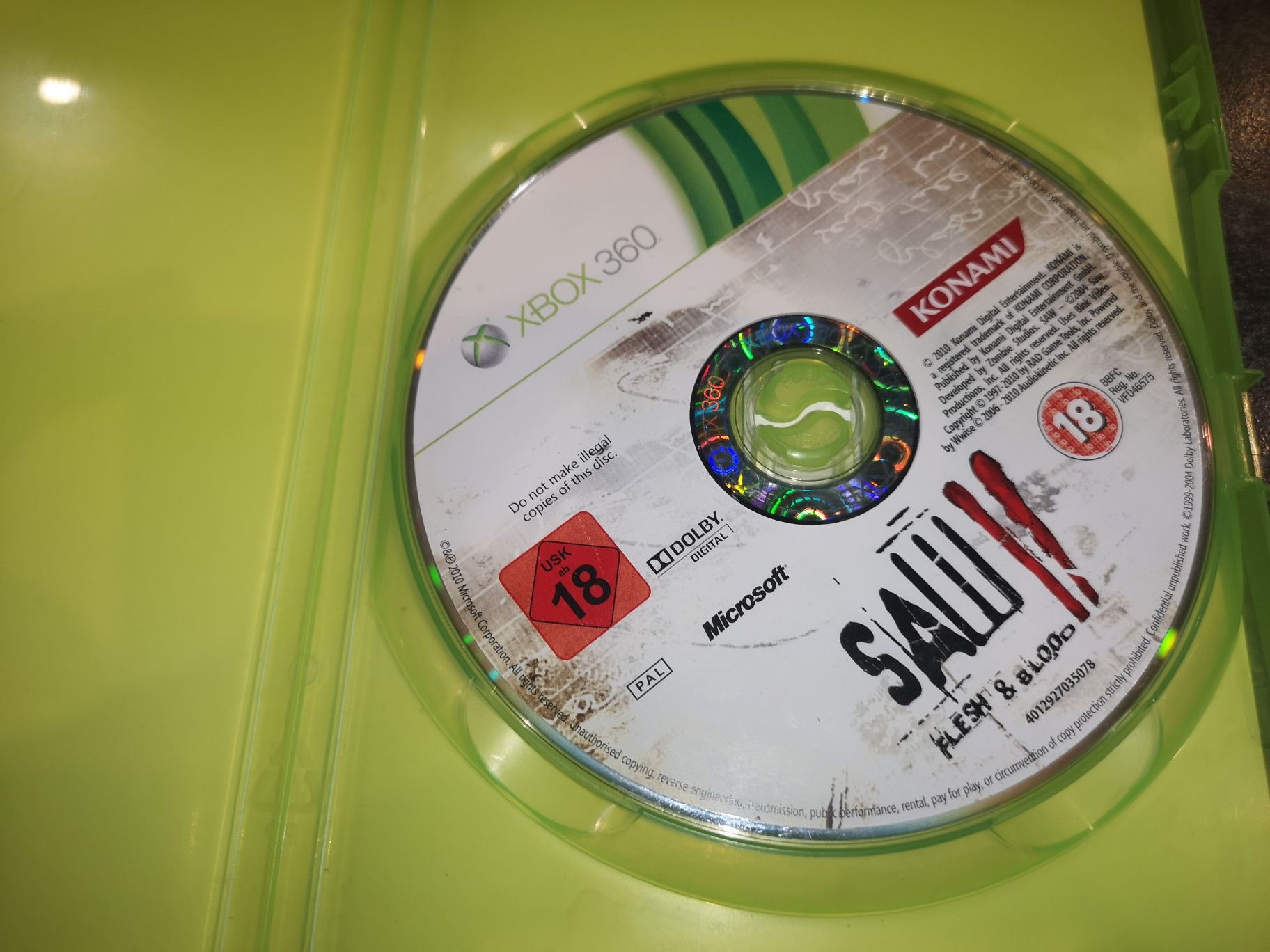 Saw 2 Flesh & Blood XBOX 360 gra (stan bdb) horror