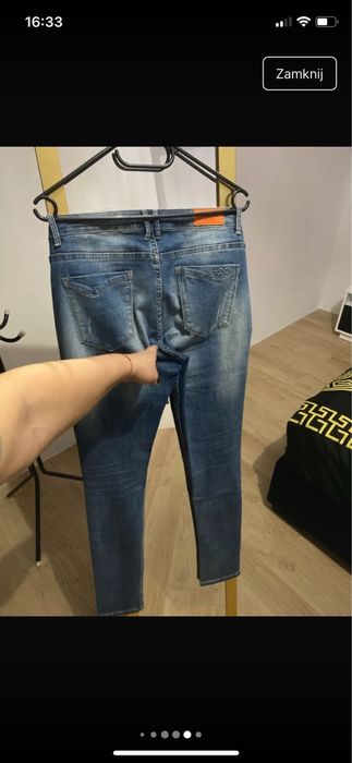 Spodnie jeansowe gumowane z dziurami rozmiar XL