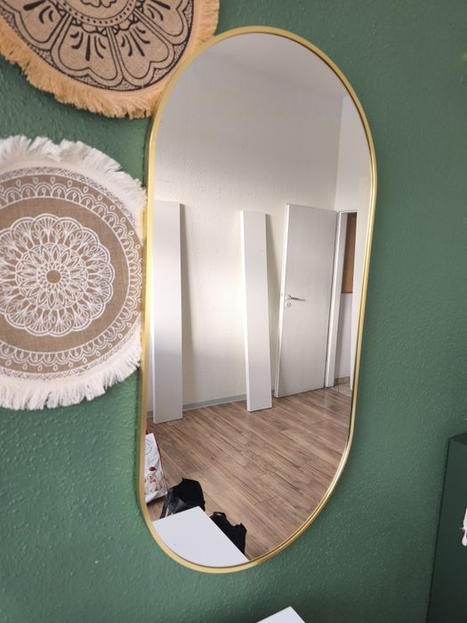 Nowoczesne lustro w złotej ramie owalne 100x50 cm IKEA Mufart