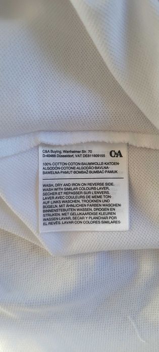 Biała koszulka POLO. Rozmiar L.