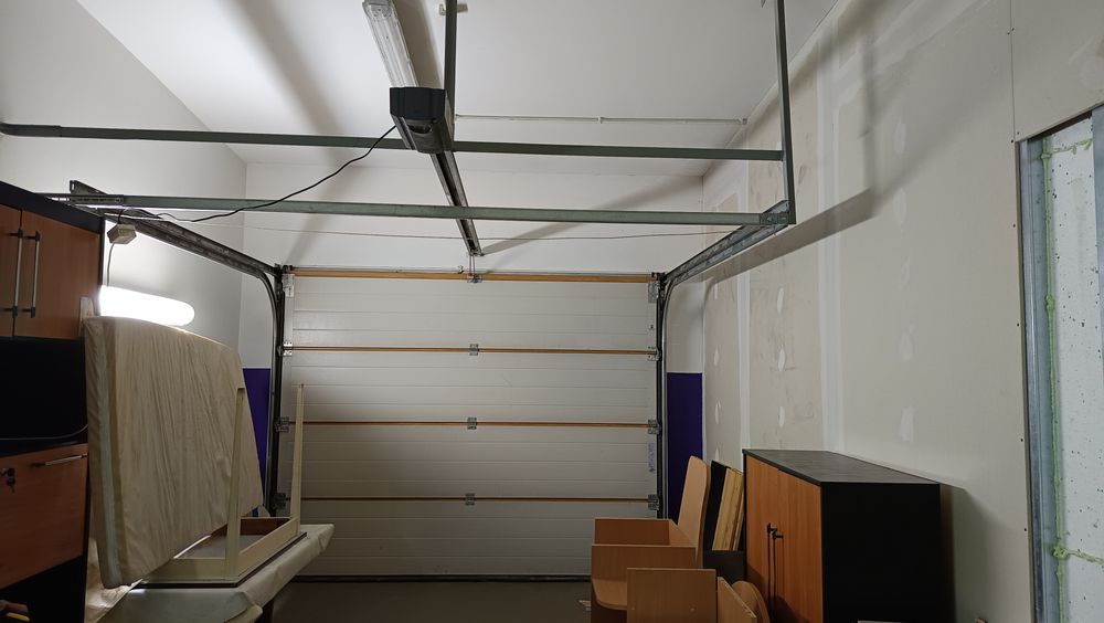 Brama garażowa segmentowa Hörmann ProMatic z napędem (na pilota)