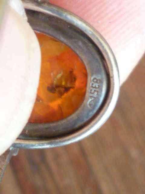 Srebrny pierścionek z bursztynem Fischland 835