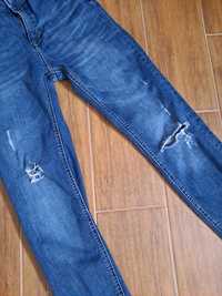 Spodnie jeans Reserved 36 wysoki stan przetarcia dziury