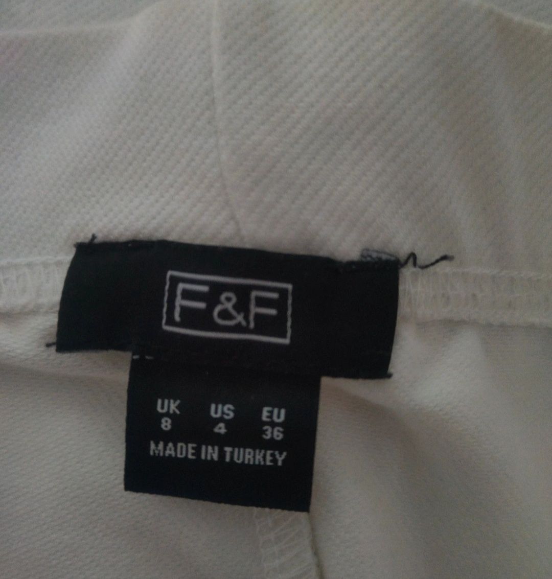 Białe leginsy bawełna poliester r 36 F&F