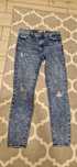Spodnie jeans z dziurami L 40