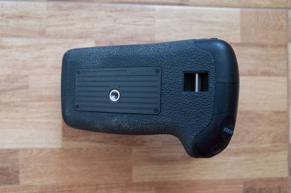 Punho de bateria Canon BG-E9, battery grip,  em bom estado.