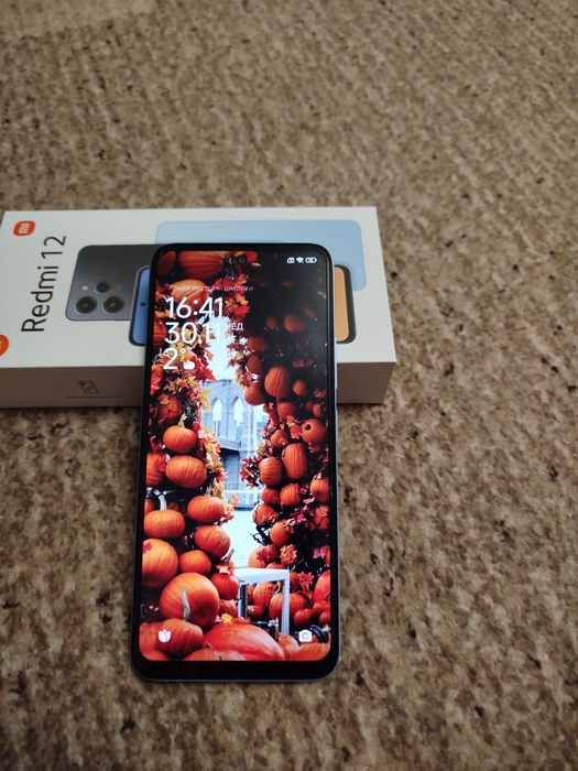 Редмі 12 128 гб.