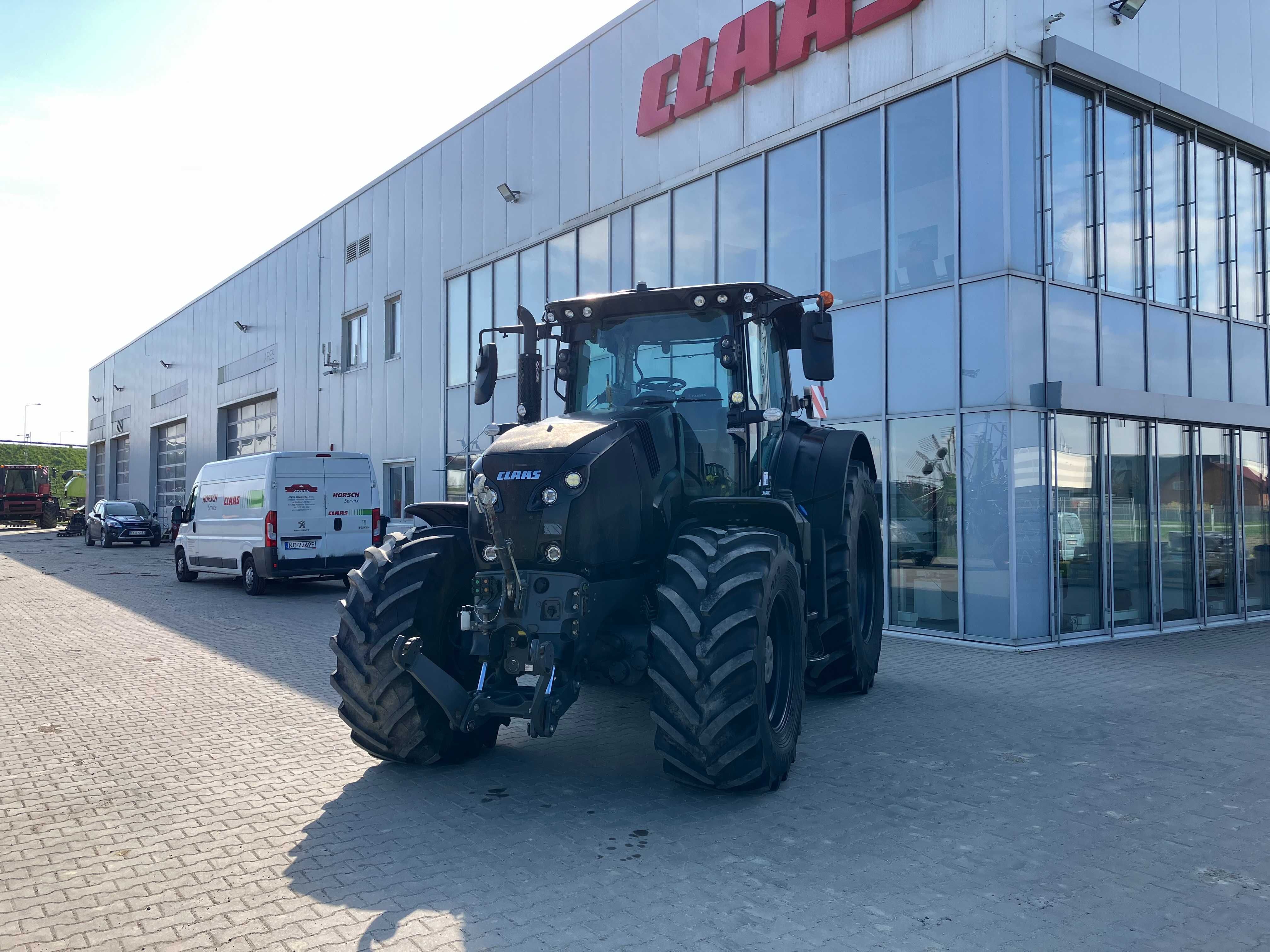 Трактор Claas Axion 830