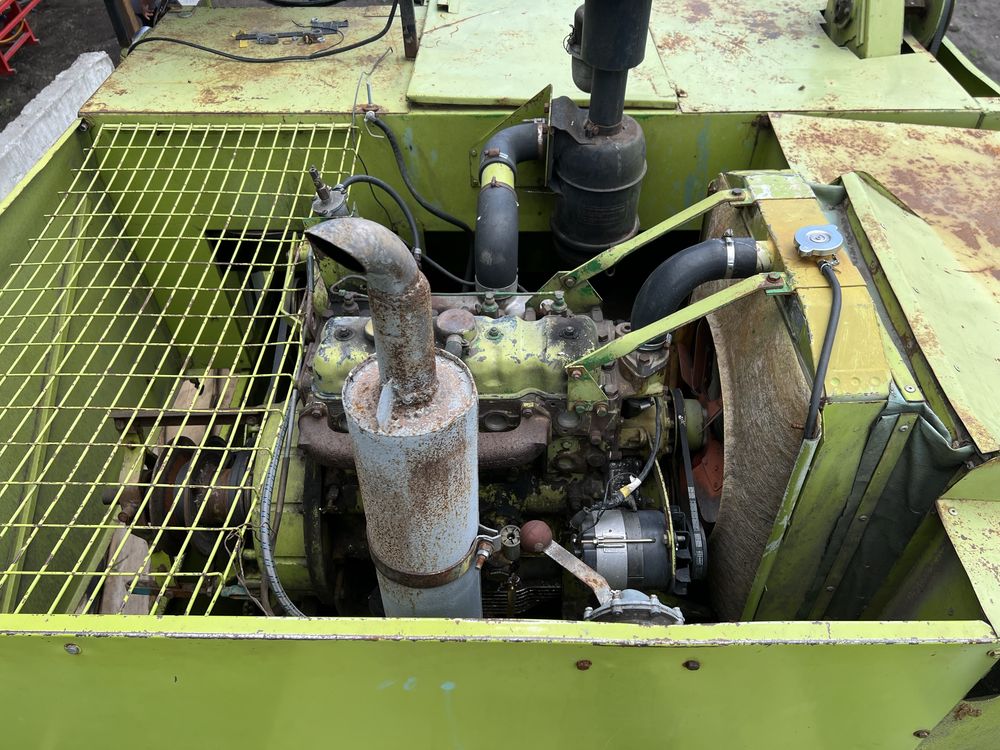 Комбайн Claas compact 25