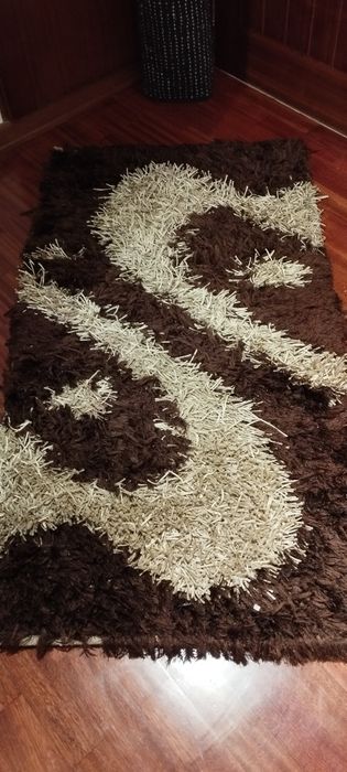 Tapete de casa castanho