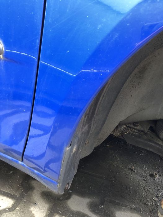 Błotnik prawy przód przedni Skoda Fabia II 2 LF5K