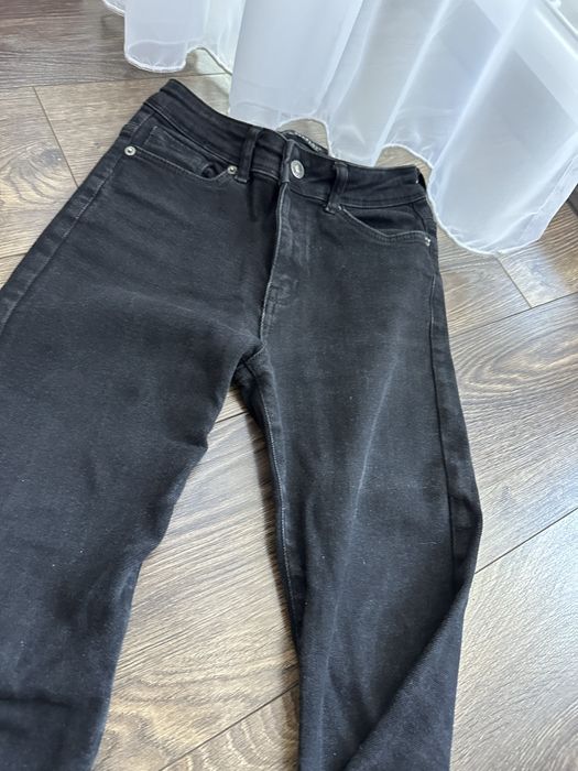 Джинси чорні кльош