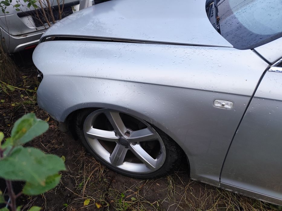 Audi A6 C6 LY7W blotnik lewy przód