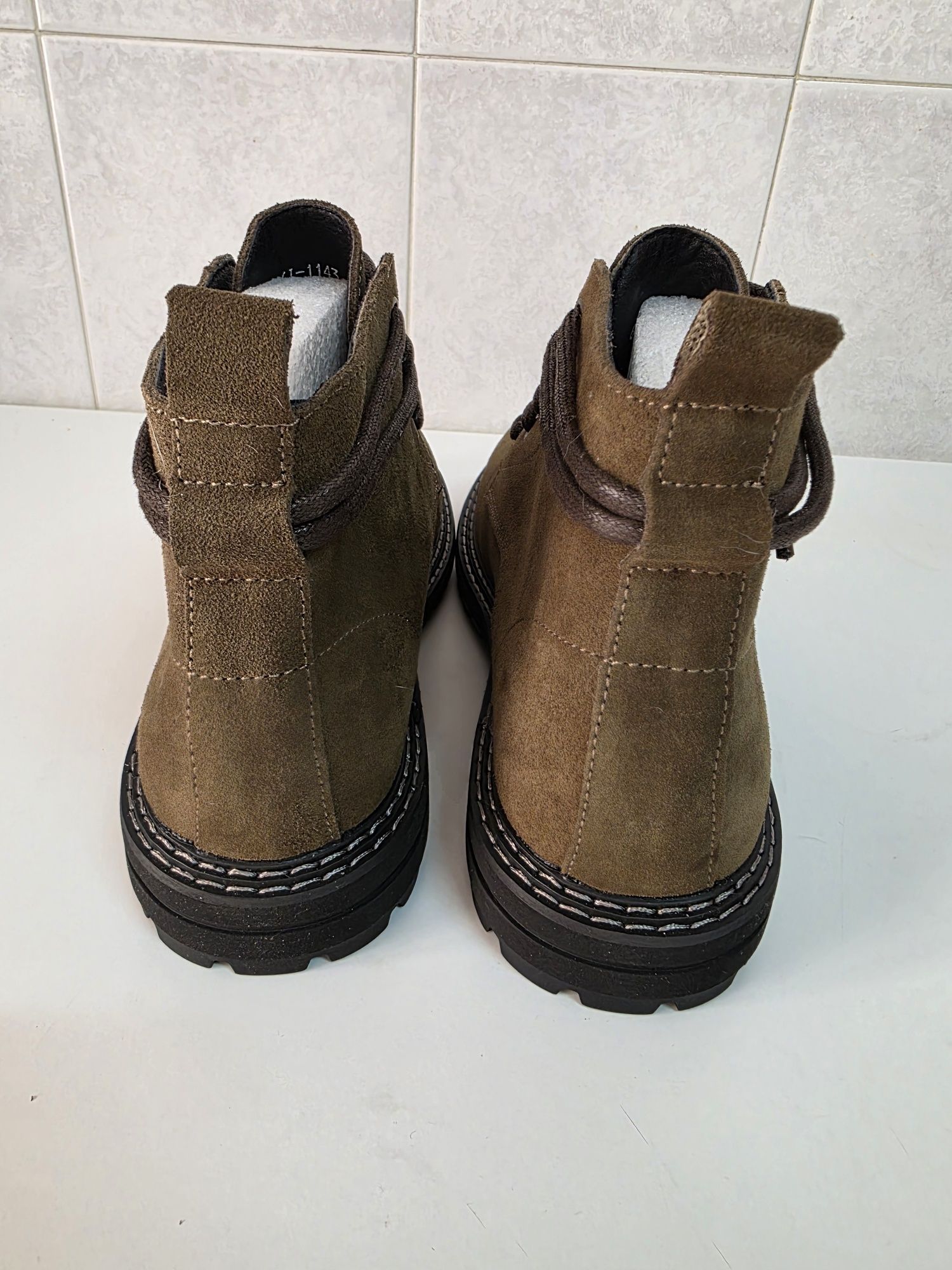 Botas de cano curto em couro