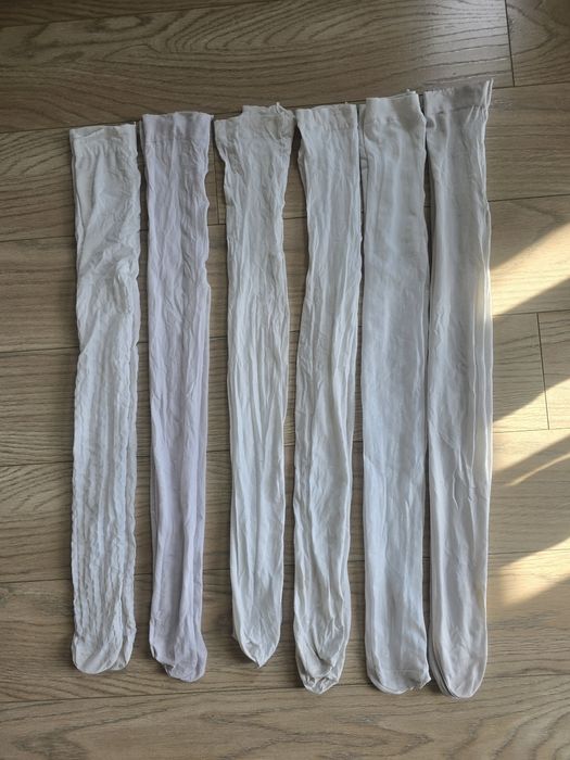 Zestaw białych rajstopek r. 128-134