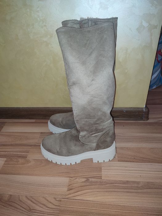 Зимові чоботи та черевики