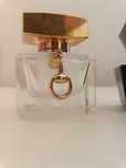 Flakony po perfumach Gucci
