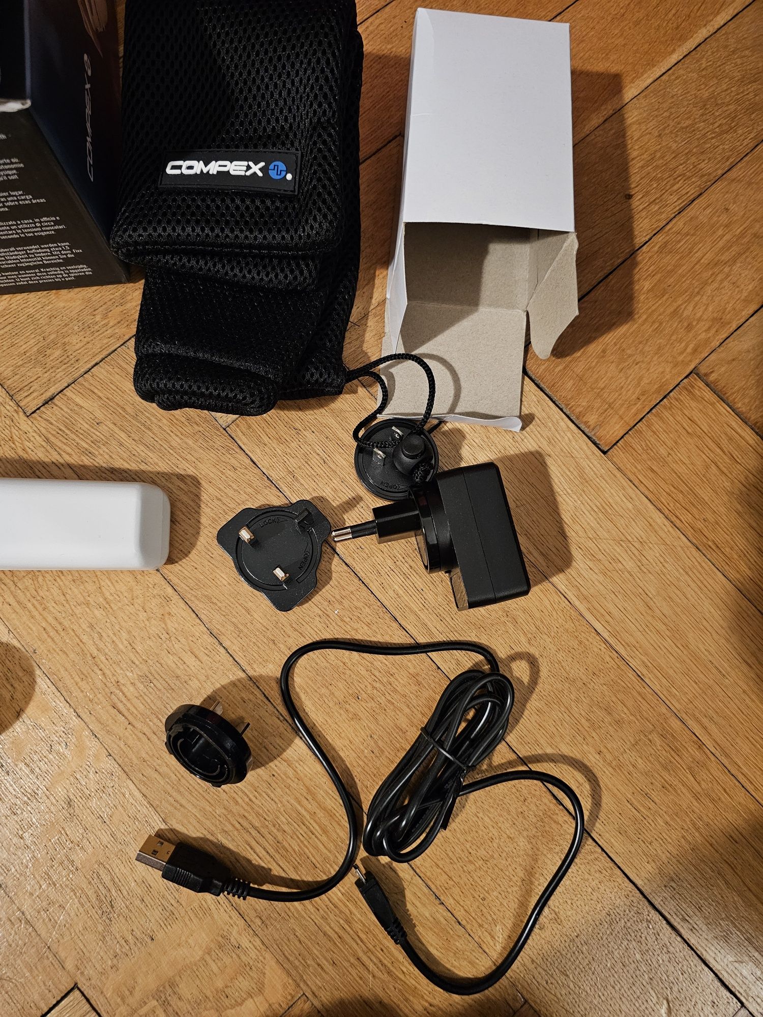 Compex Fixx Mini Stymulator mięśni biały Masażer Pistolet Ultra Fix