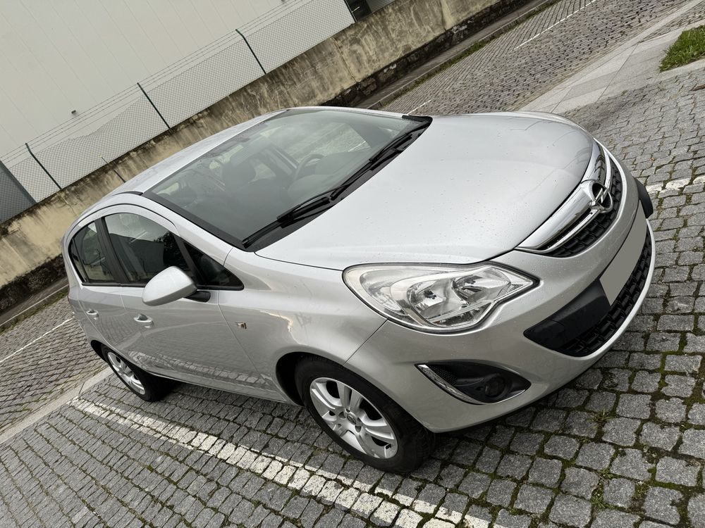 Opel Corsa - 2012 c/ GPS - 1.2