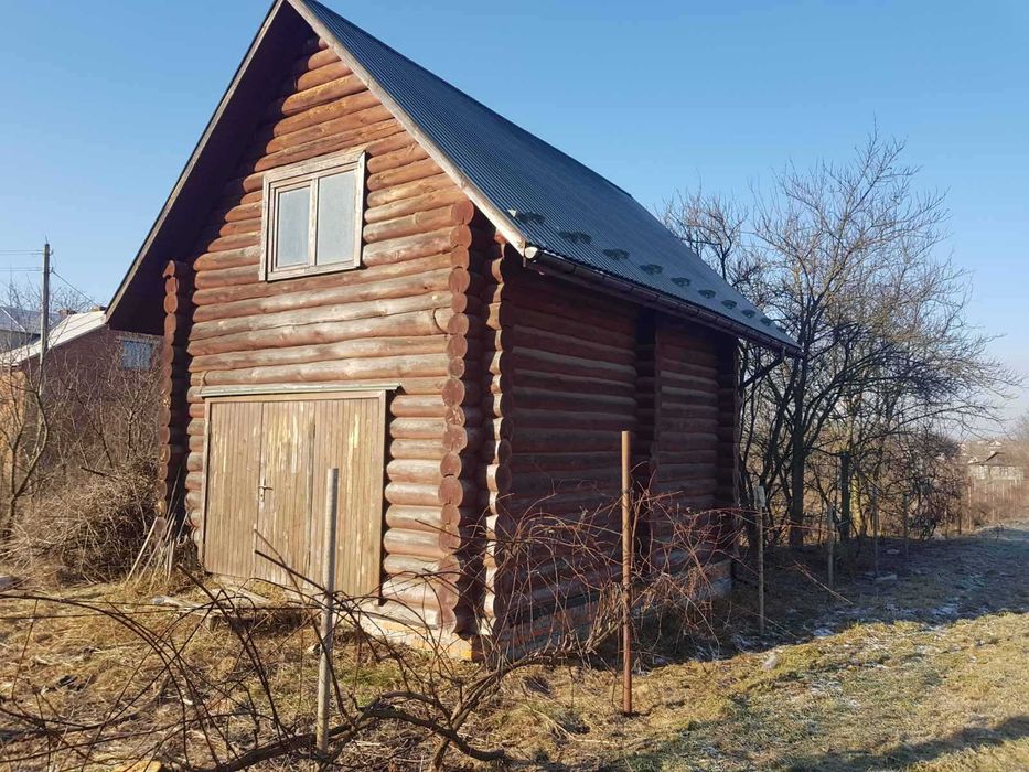 Будиночок зі зрубу та земельна ділянка 15 сот. с. Забужжя