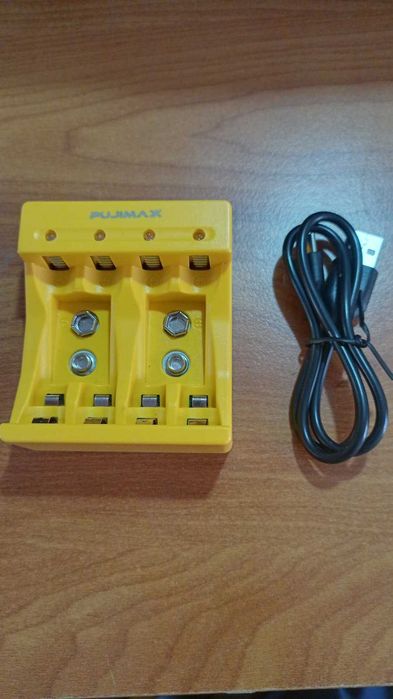 Прилад для зарядки акумуляторів АА, ААА, крони.