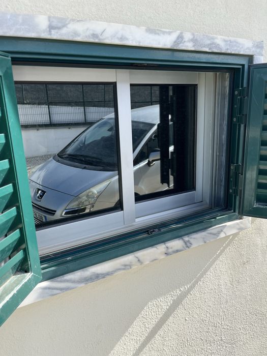 Portada de janela verde