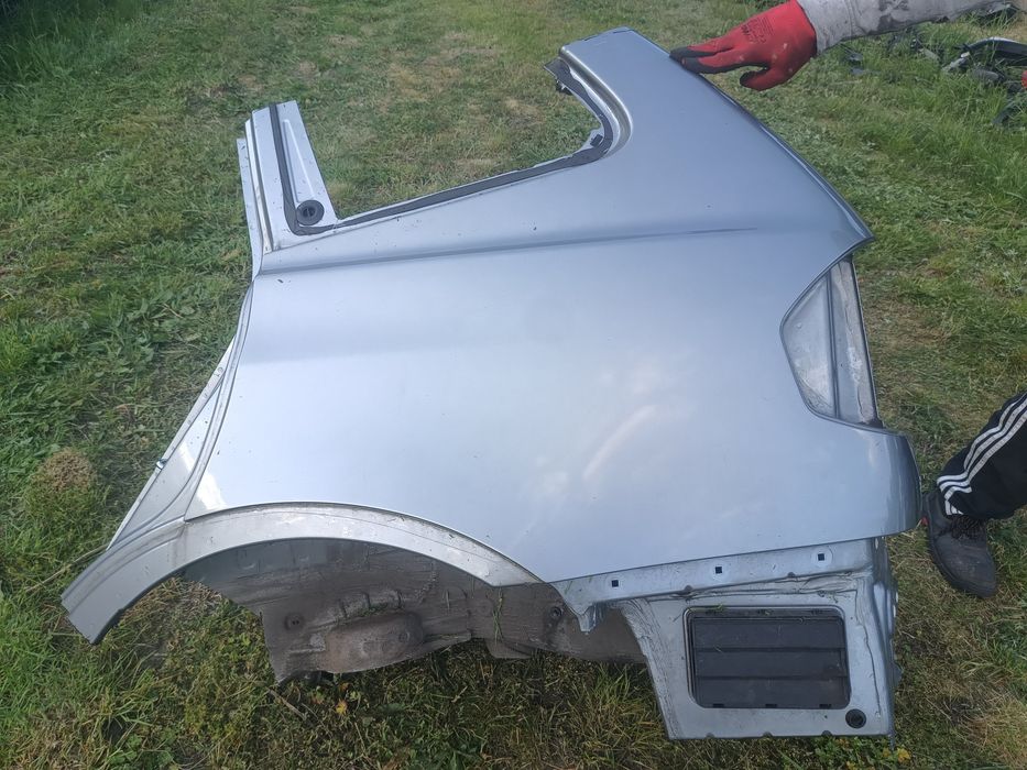 BMW X3 E83 blotnik cwiartka lewy tyl kolor A08/7