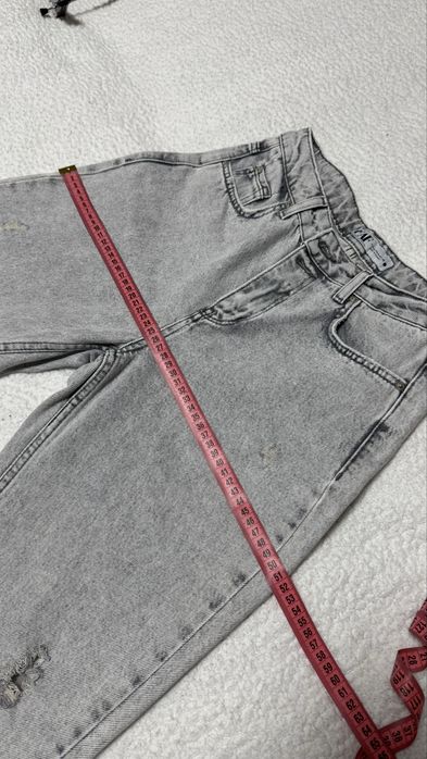 Джинси сірого кольору