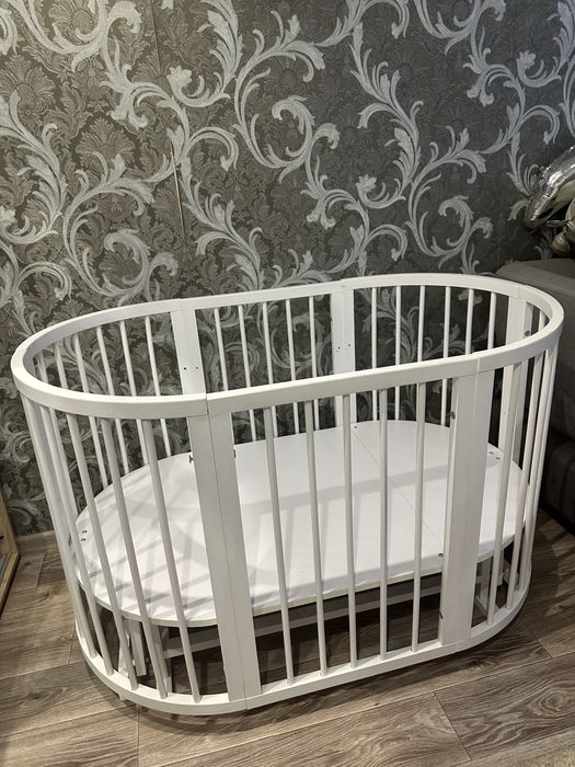 Дитяче ліжечко з маятником 2 в 1