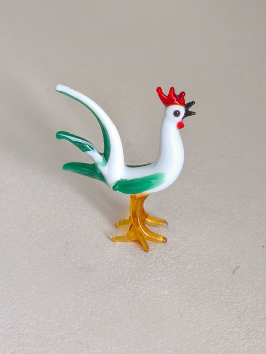 Pequeno galo de vidro