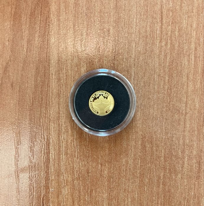 Moneta złota z „Odchodzącą postacią J. Pawła II