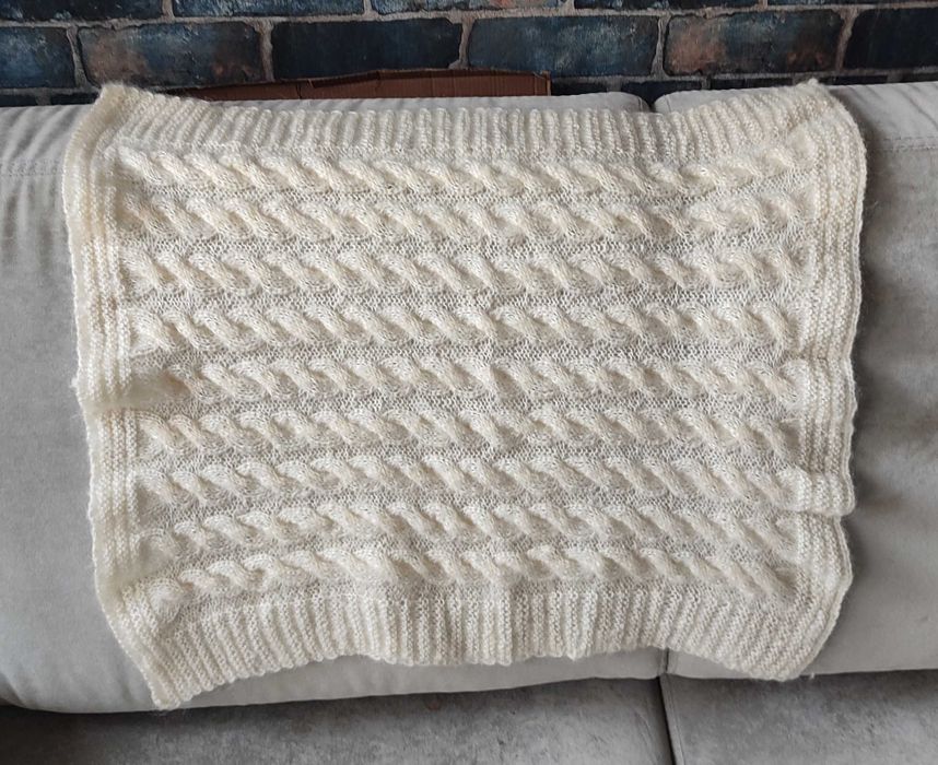 Wełniany kocyk do gondoli wózka